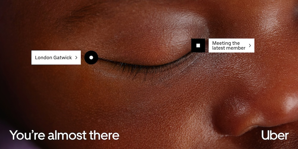 Billboard of Uber's Gatwick ad featuring a baby.